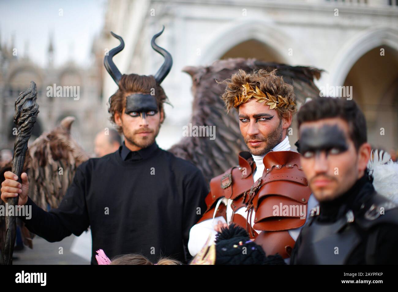 Venice, Italy - February 16, 2020: Masks participants of the 2020 Carnival celebrations St. Mark's Square. Stock Photo