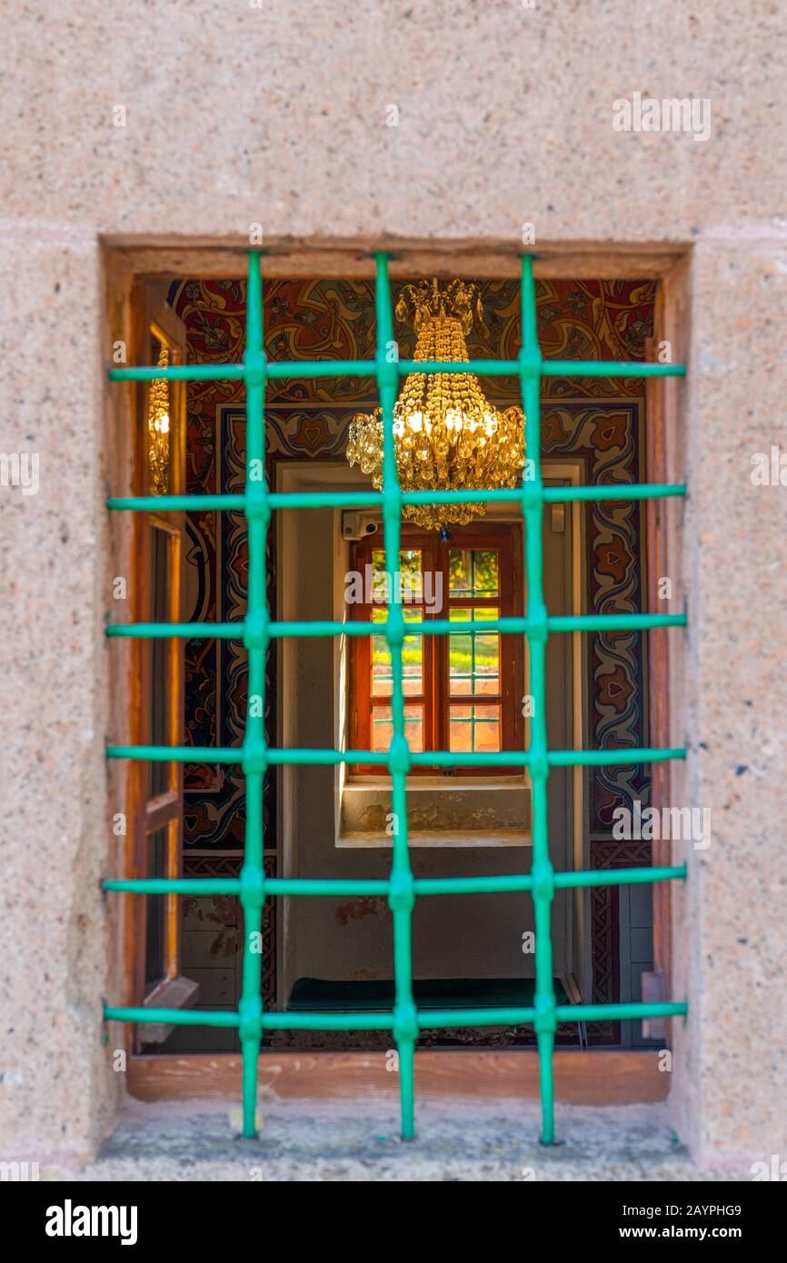A wooden window with iron guard in Haci Bektas, Nevsehir, Turkey Stock Photo