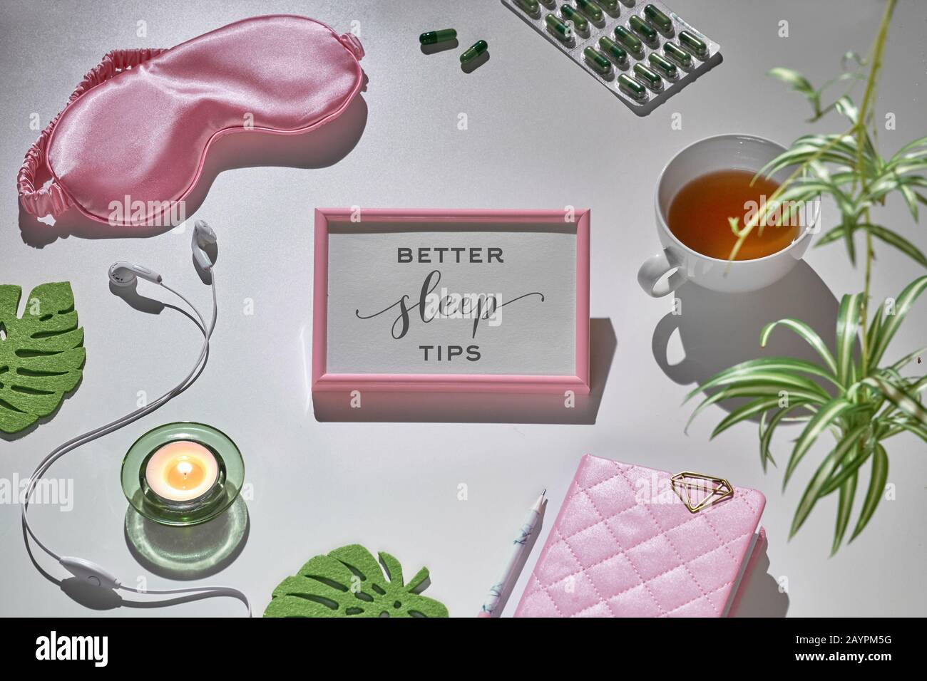 Healthy night sleep creative concept in pink and green. Sleep mask