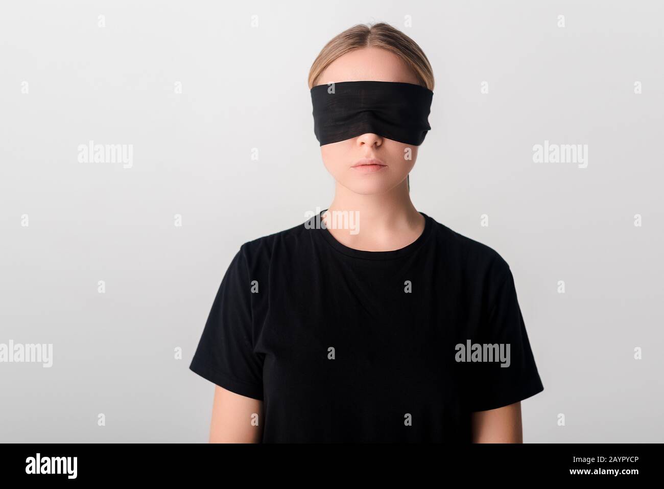 Young woman blindfolded Stock Photo by ©semisatch 66901649