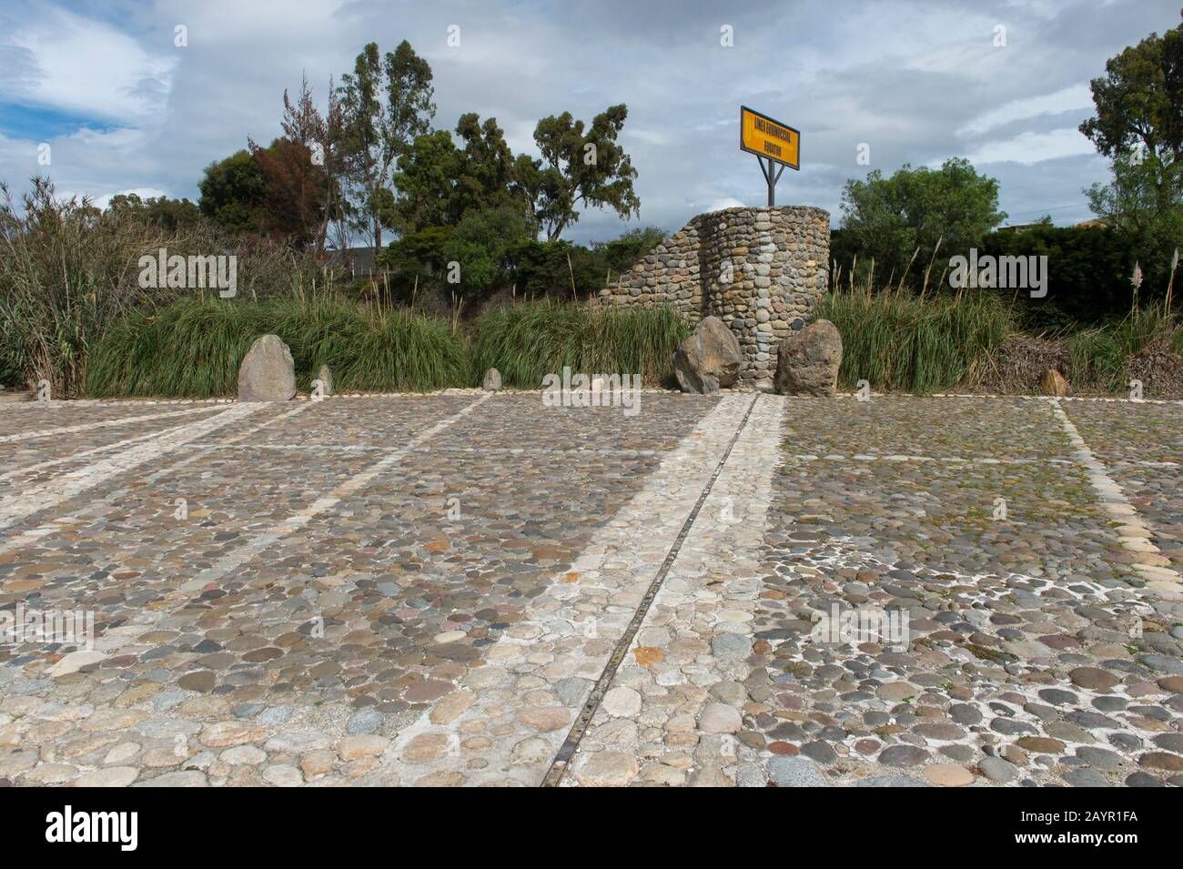 The Equator Line at the Quitsato equator monument and sundial near Cayambe in the highlands of