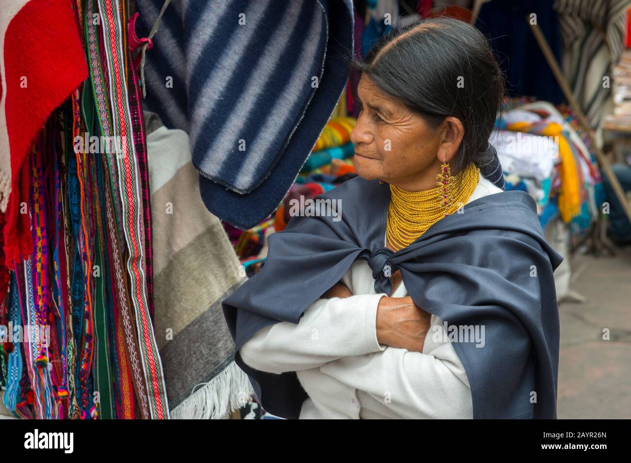 Portrait of an Otavalo woman on the market in the town of Otavalo in the highlands of Ecuador near Quito. Stock Photo