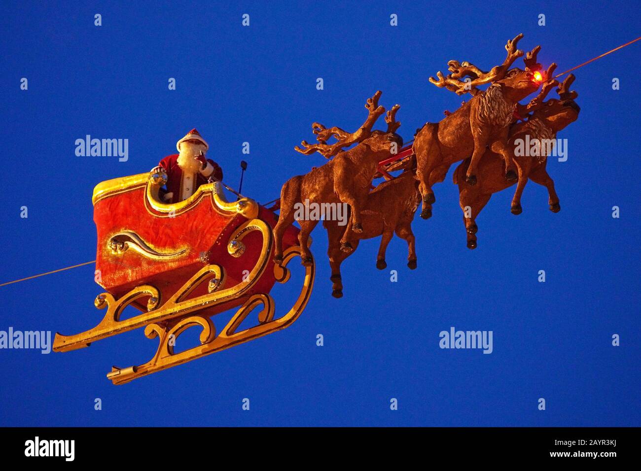 Santa Claus and his flying reindeers, who pull his sleigh on the Bochum Christmas market, Germany, North Rhine-Westphalia, Ruhr Area, Bochum Stock Photo