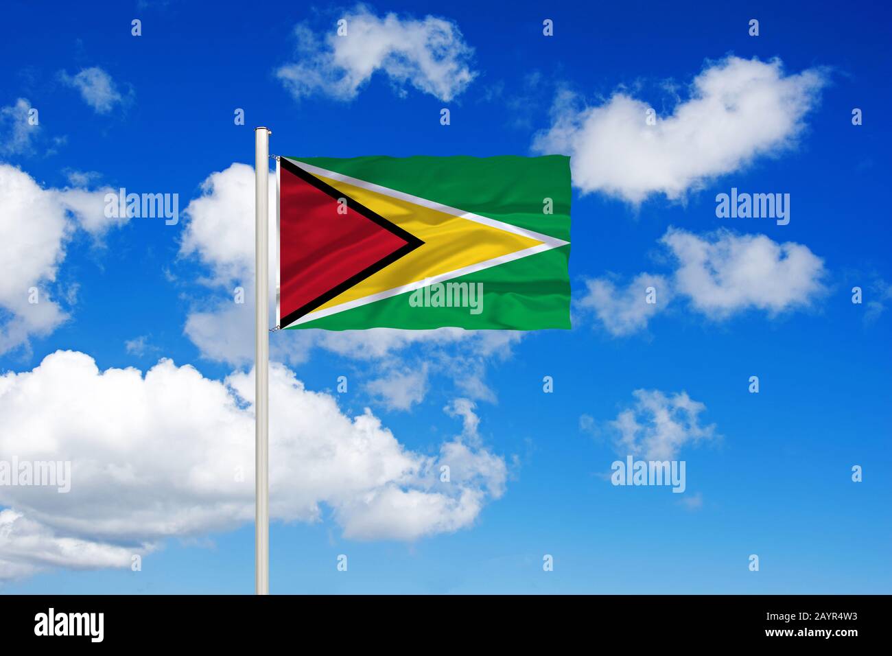 flag of Guyana in front of blue cloudy sky, Guyana Stock Photo Alamy