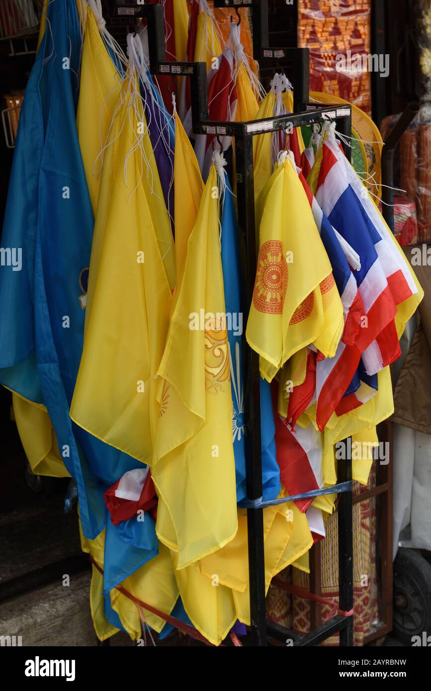 Display of colourful flags for sale at an outdoor market, Chiang Mai, Thailand Stock Photo