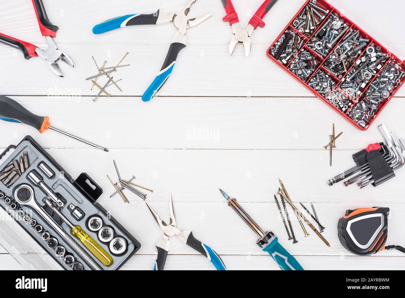 Frame With Tools Frame of tools with tool boxes on white wooden surface Stock Photo - Alamy