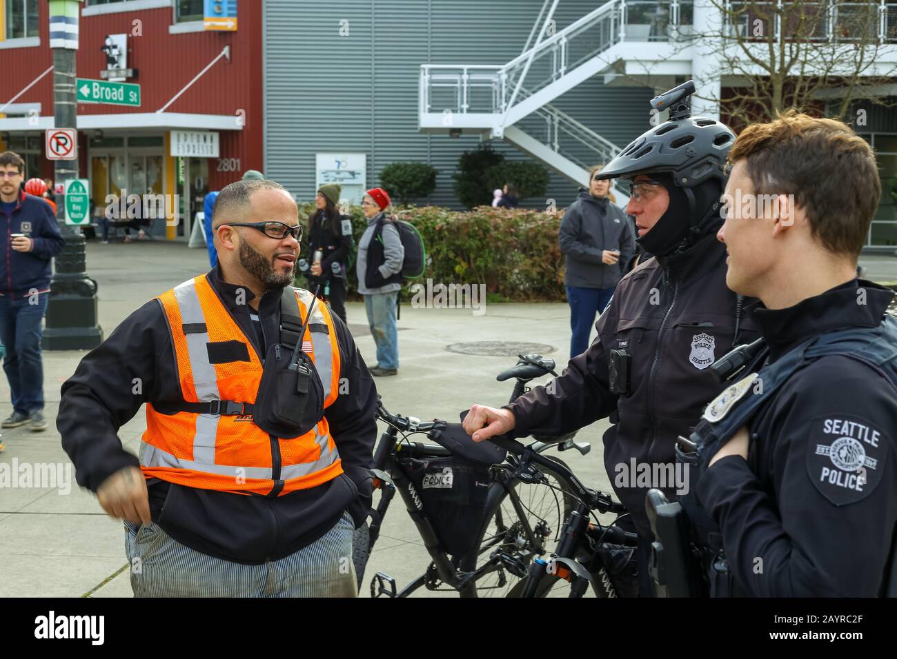 SEATTLE - FEBRUARY 16: A BNSF Railway engineer whose train was blocked by protesters speaks with Seattle Police. Stock Photo