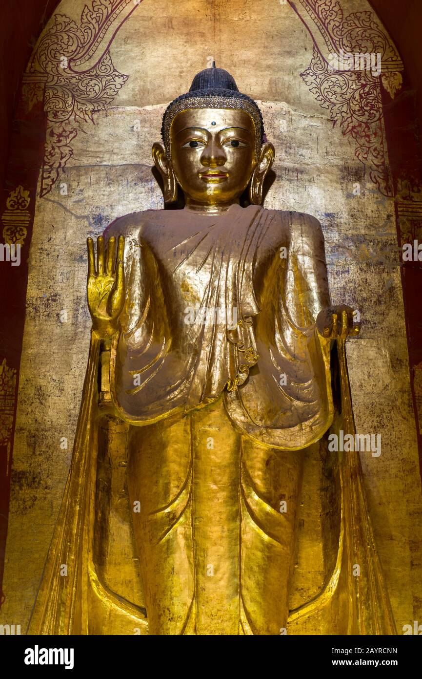 One of the four Buddha statues inside the Ananda Temple, which is a Buddhist temple, built in 1105 AD during the reign (1084 to1113) of King Kyanzitth Stock Photo
