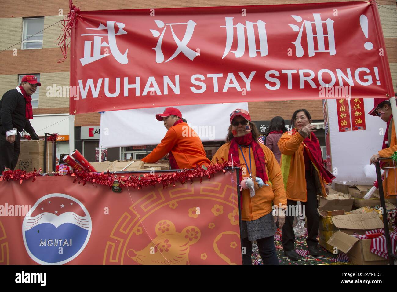 Reference to Wuhan, the largest city in Central China, and the plague of the Coronavirus there was not absent from the Chinese New Year Parade in Manh Stock Photo