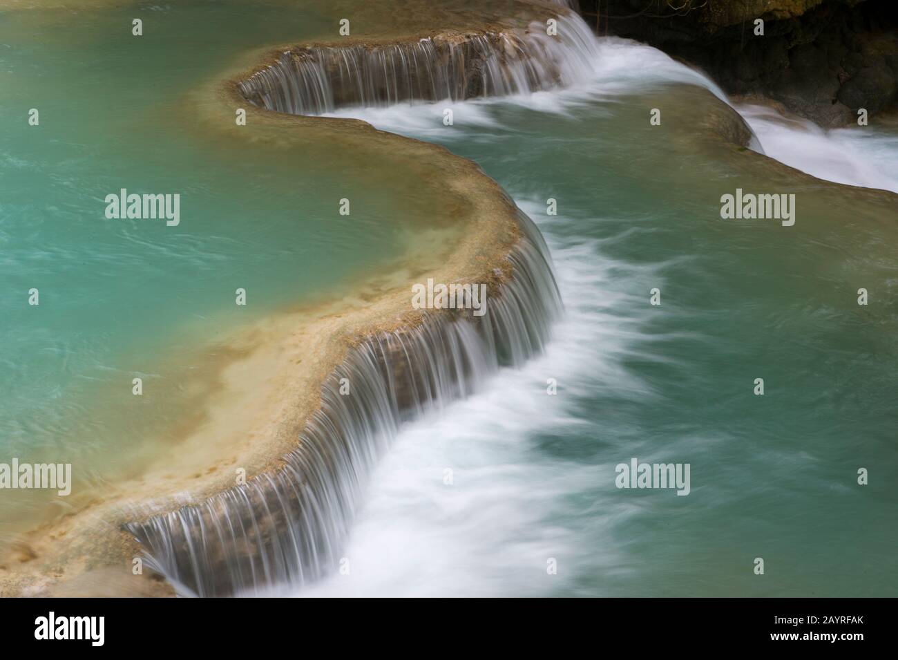 Cascades and turquoise blue pools of the Kuang Si Falls near Luang