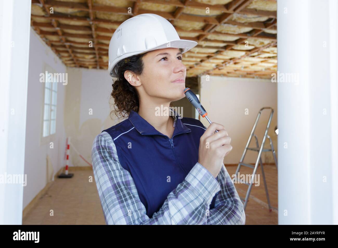 a woman is thinking about something Stock Photo