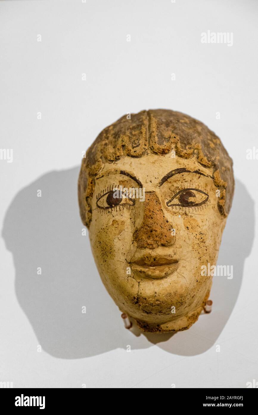 Palatine Museum, Museo Palatino, terracotta polychrome female head antefix, 530-520 BC, from Palatine Hill House of Griffins, Rome, Italy Stock Photo