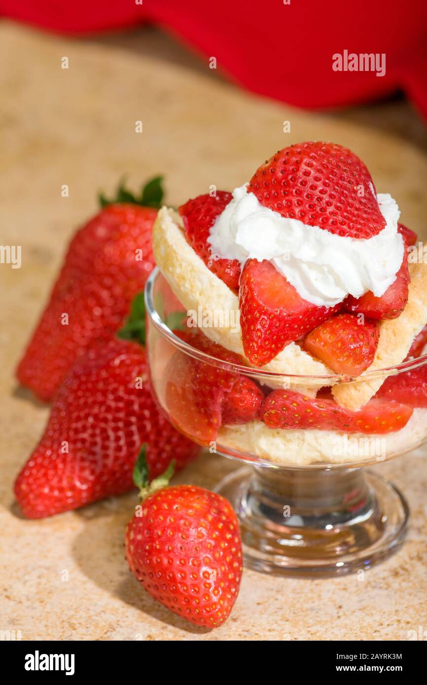 Strawberry shortcake in a glass dessert bowl Stock Photo - Alamy