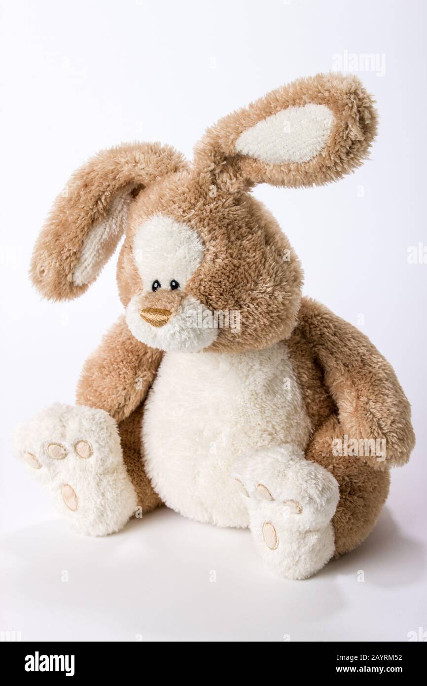 Stuffed toy bunny rabbit looking sad Stock Photo