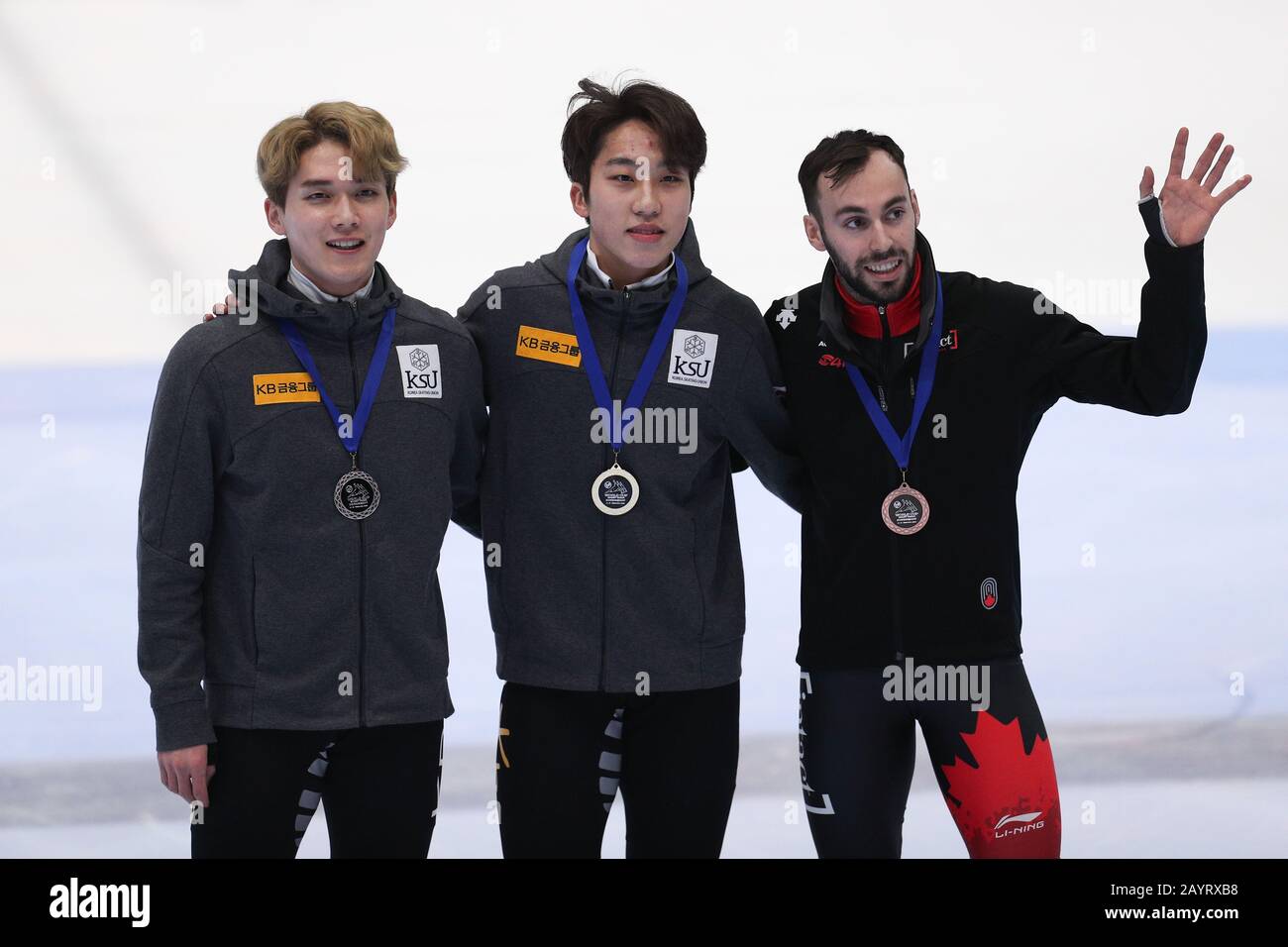 Dordrecht, Netherlands. 16th Feb, 2020. First placed Park Ji Won (C) and second placed Kim Dong Wook (L) of South Korea, along with third placed Steven Dubois of Canada pose for photos during the victory ceremony after the Final A of the Men 1000 meter race (2) at the 2019-2020 ISU World Cup Short Track in Dordrecht, the Netherlands, Feb. 16, 2020. Credit: Zheng Huansong/Xinhua/Alamy Live News Stock Photo