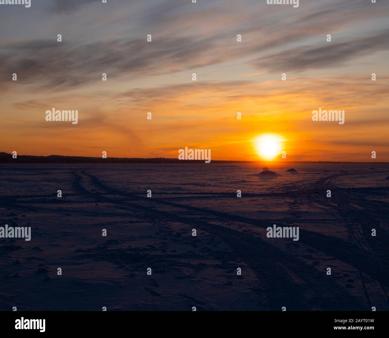 Morning sun over the Dettah ice road in Yellowknife, Northwest Territories, Canada Stock Photo