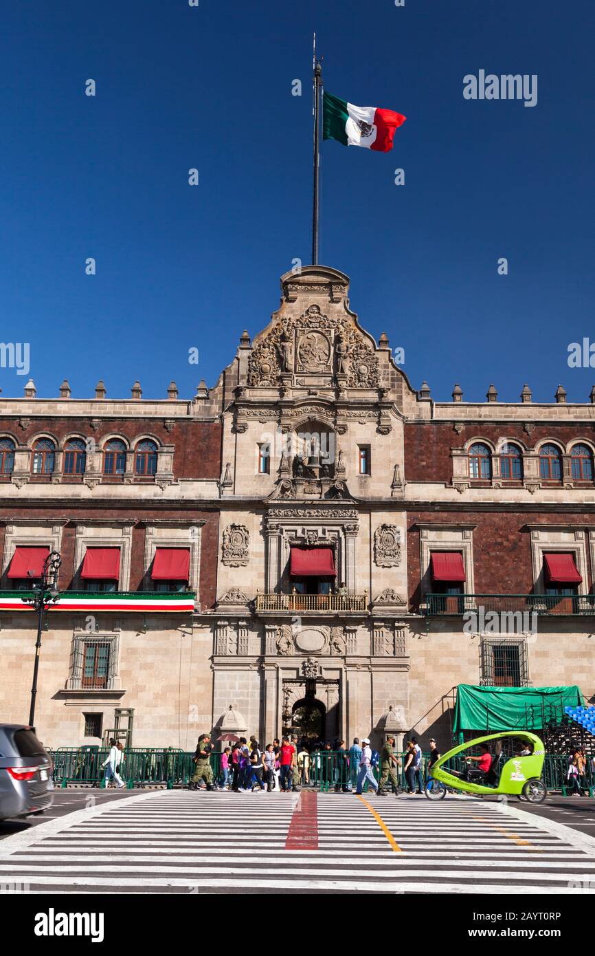 National flag and National Palace, Zocalo, Plaza de la Constitucion, Mexico City, Mexico, Central America Stock Photo