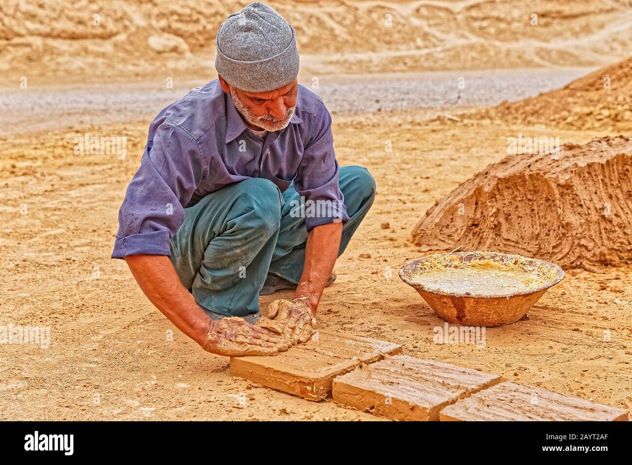 Clayman making bricks Stock Photo