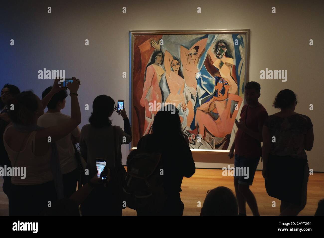 moma-visitors-photographing-pablo-picasso-s-painting-les-demoiselles-d