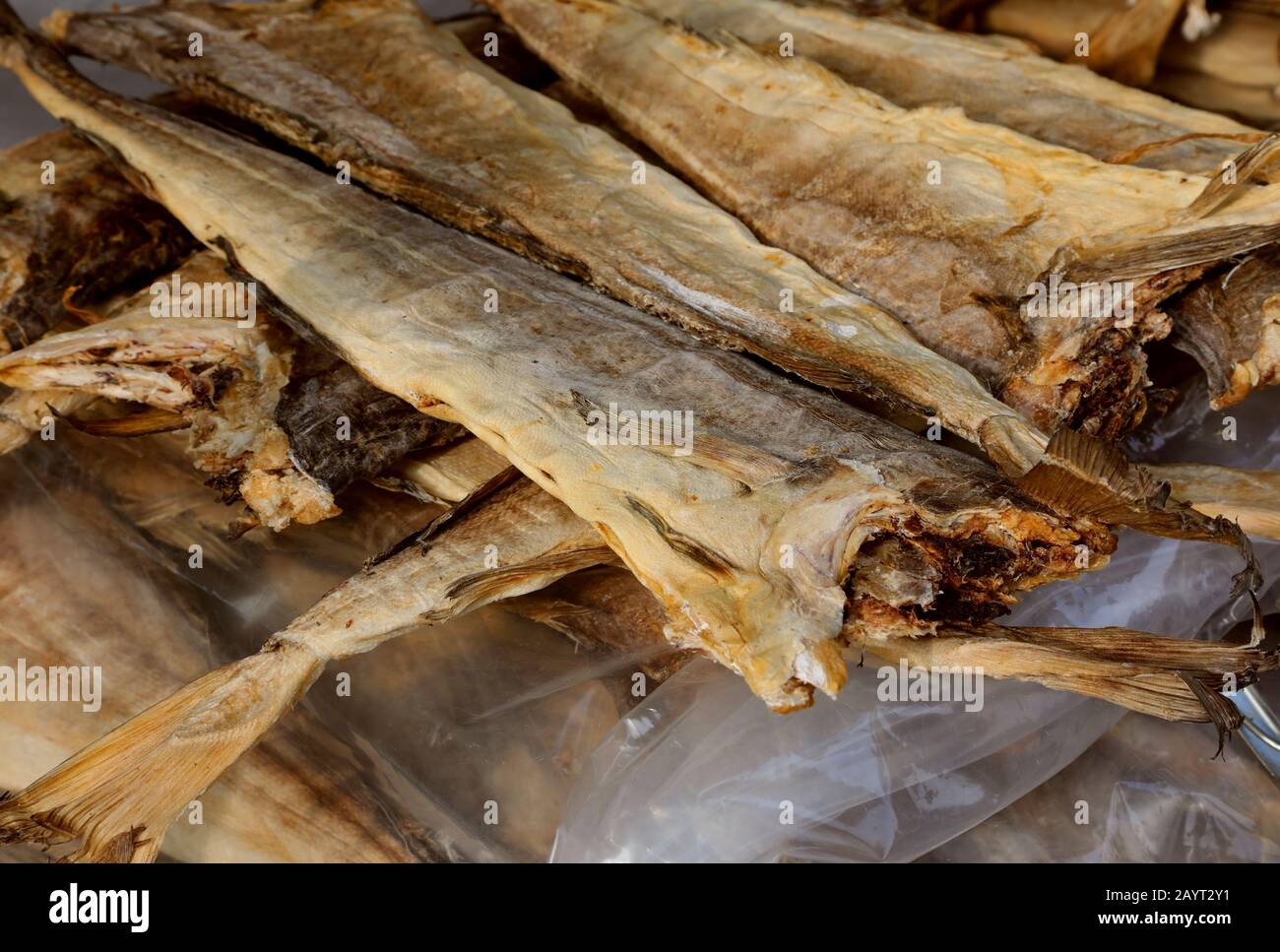 Many dried fish called stockfish for sale at european market Stock