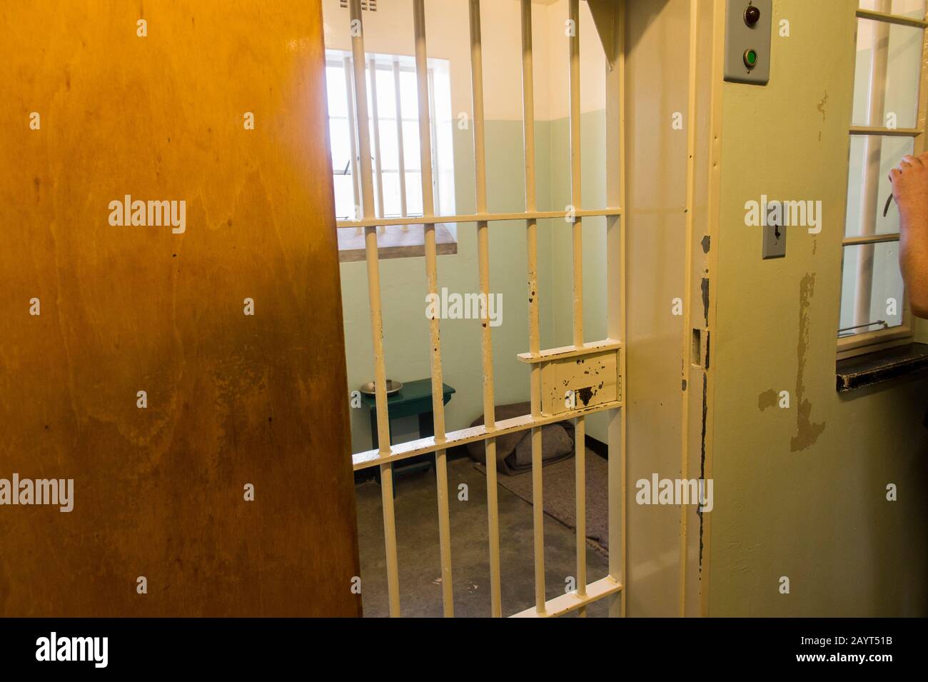 Nelson Mandelas prison cell at the maximum security prison on Robben Island, which is an island in Table Bay, 6.9 km west of the coast of Cape, South Stock Photo