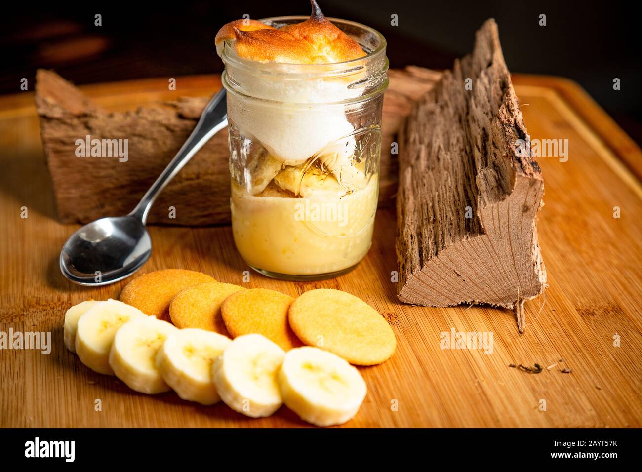 Banana Nilla Wafer Pudding Desert on Wood Cutting Board with Spoon Food Photography Stock Photo