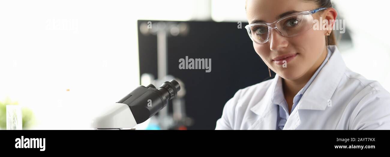 Smiling biomedical researcher in eyewear Stock Photo