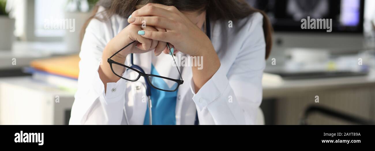 Upset doctor at hospital office Stock Photo
