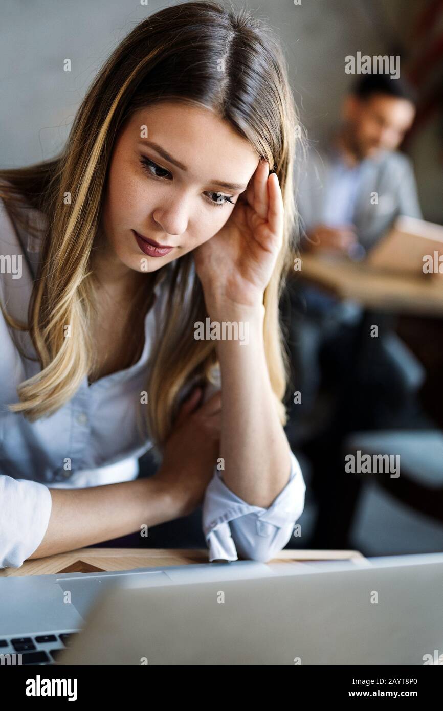 Programmers working in a software developing company office Stock Photo