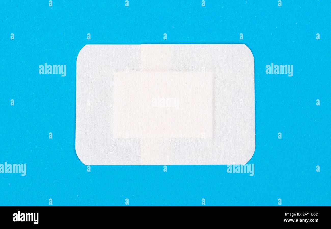 Band-aid isolated against a blue background, white Stock Photo