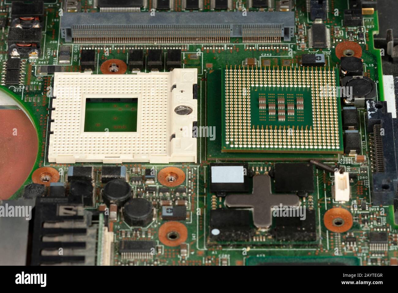 Close up of  laptop processor  with empty socket base for CPU on main board of notebook. Stock Photo