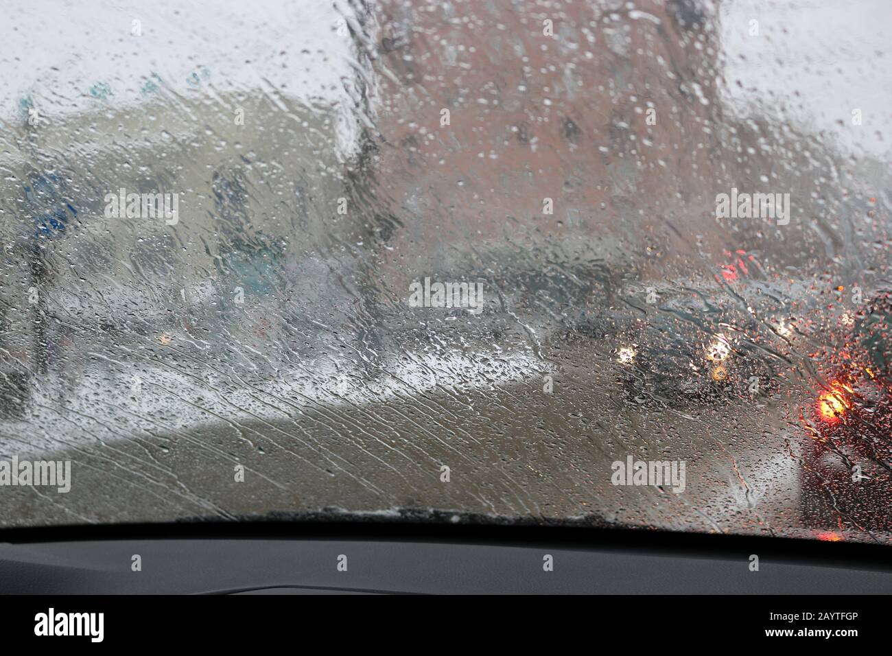 Rainy city view from window hi-res stock photography and images - Alamy