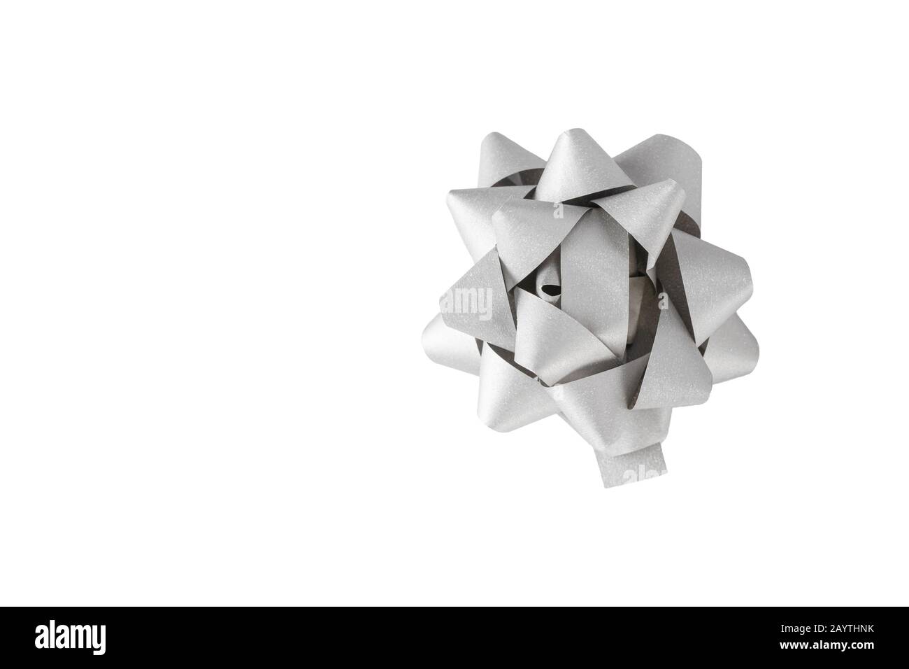 Silver Christmas festive bow on white background. Stock Photo