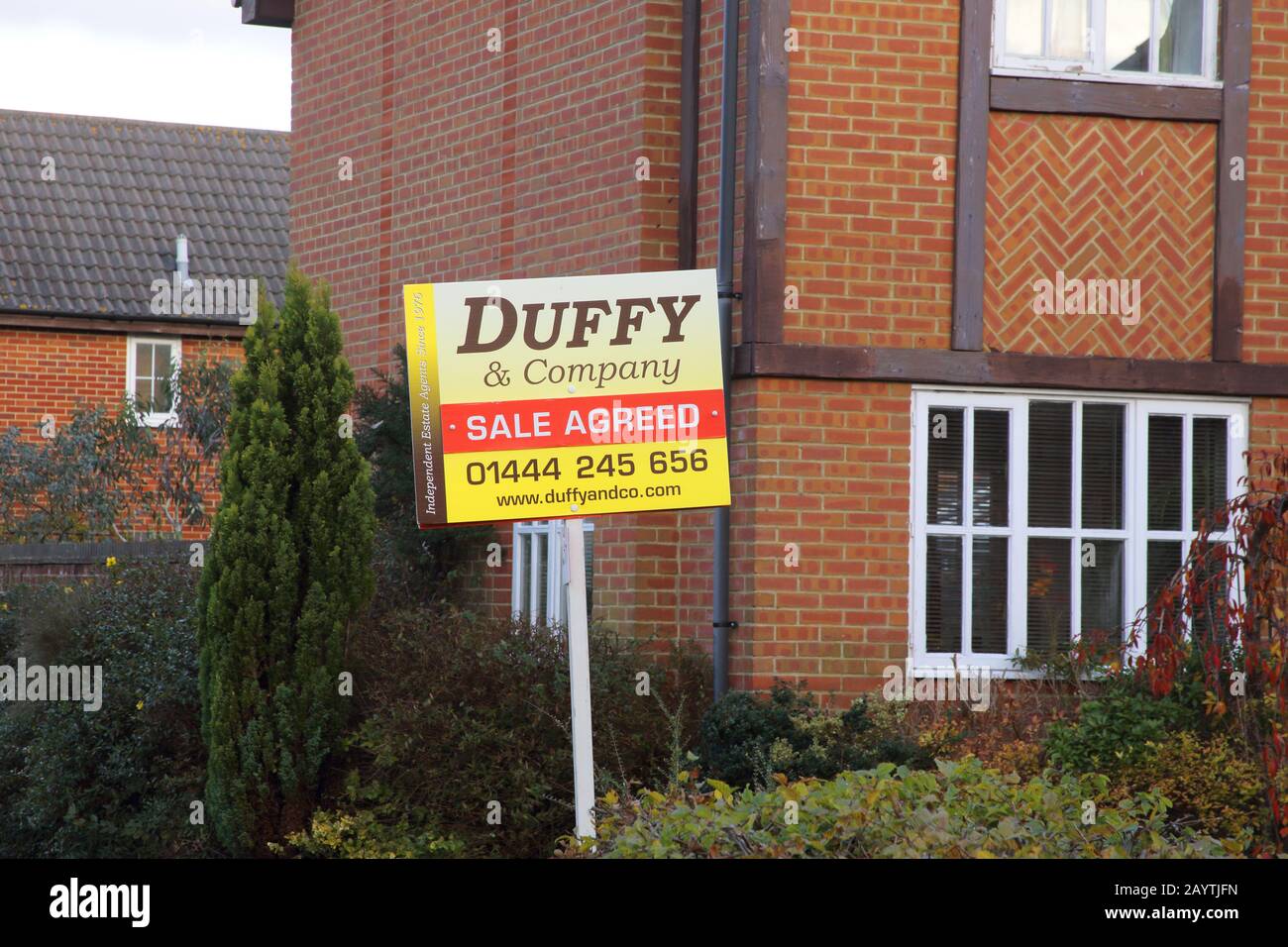 estate agents sign house sold in burgess hill west sussex Stock Photo