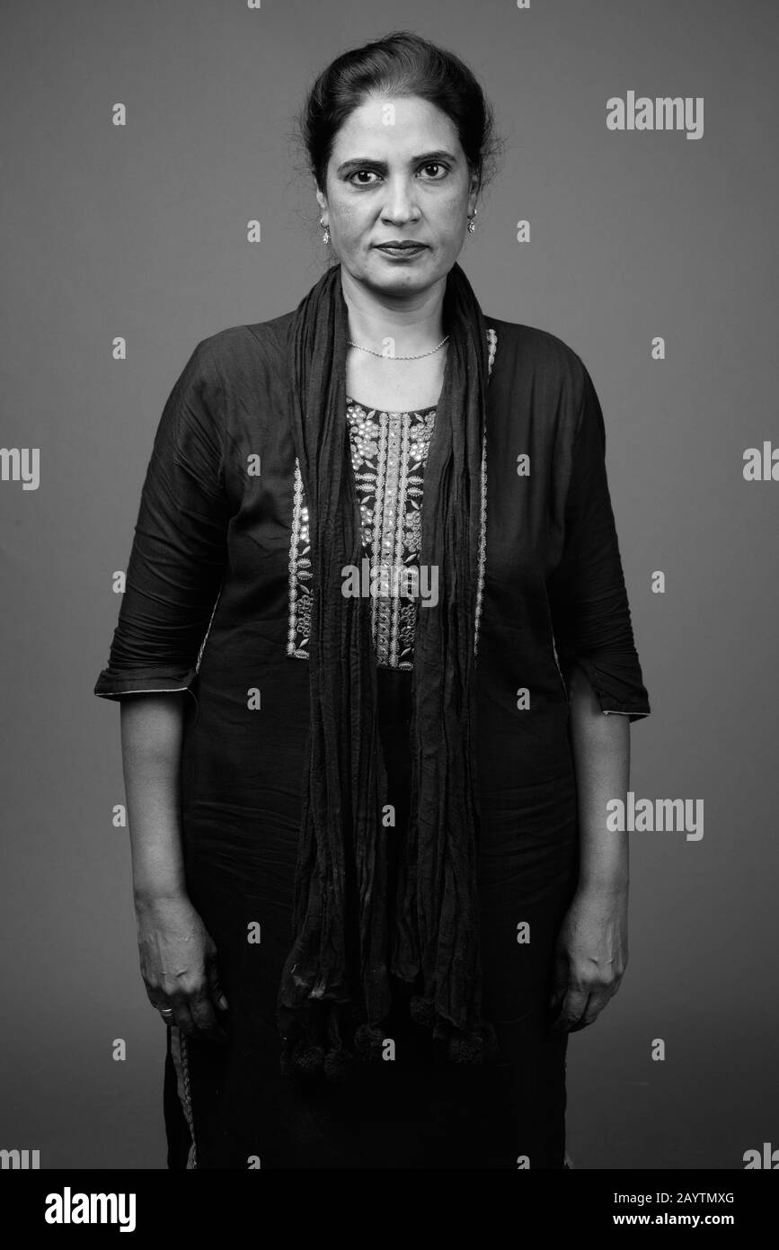 Indian woman black background Black and White Stock Photos & Images - Alamy