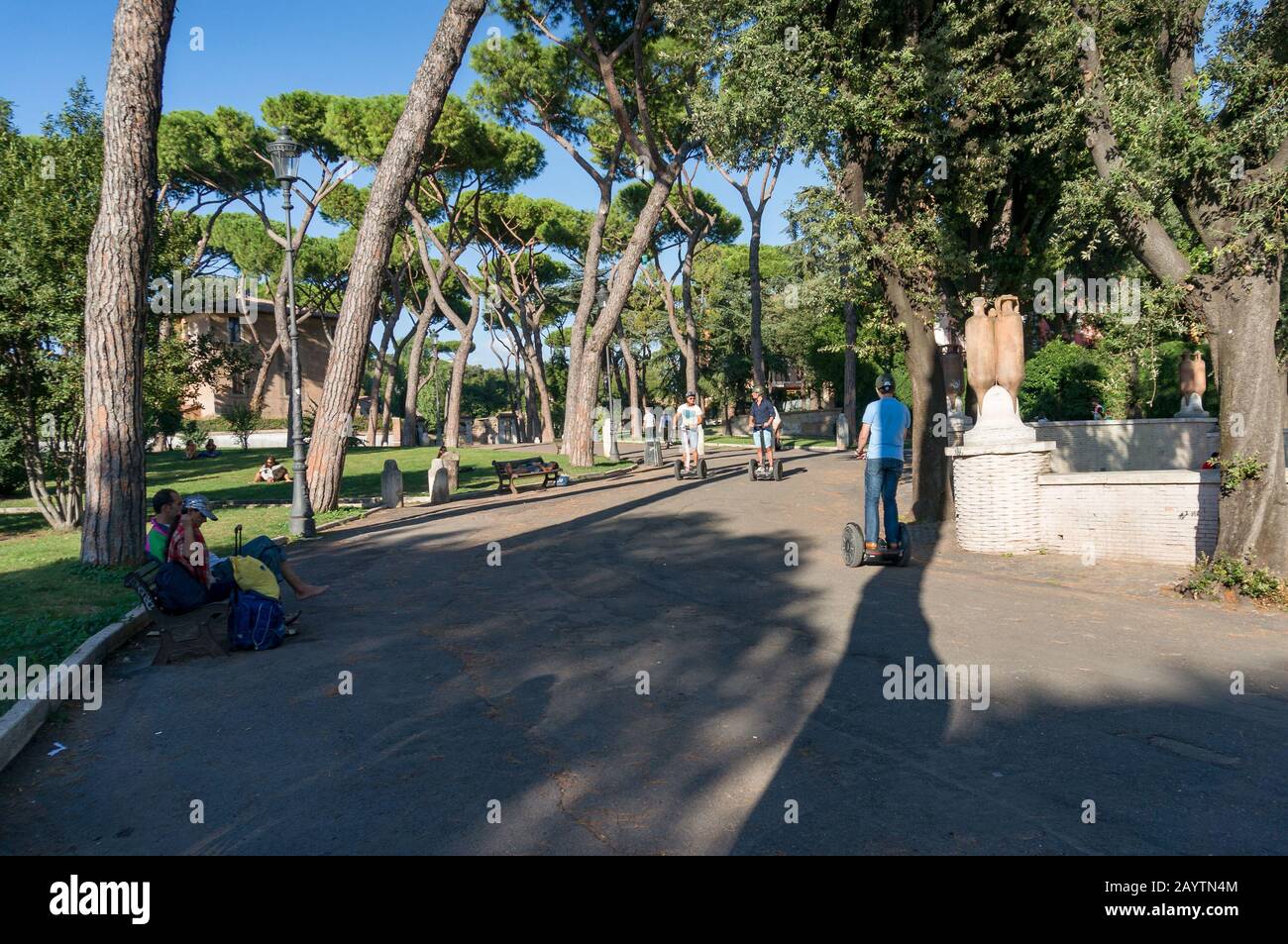 Rome, Italy - September 21, 2013: People on gyro scooters, segways in Parco del Colle Oppio public park in Rome Stock Photo