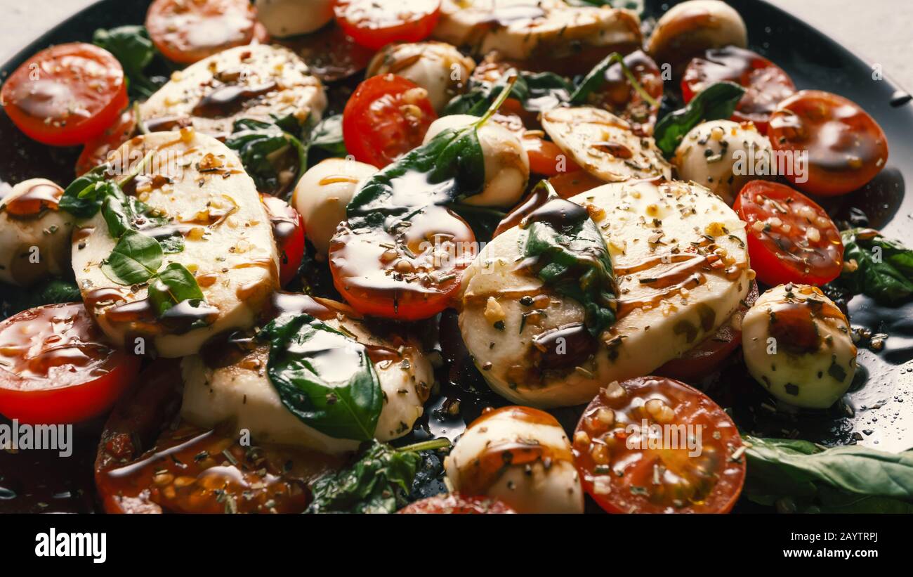 caprese pasta salad recipe, tomatoes mozzarella, insalata caprese, buffalo  mozzarella cheese, bocconcini, cherry tomato basil, cherry tomato basil  Stock Photo - Alamy