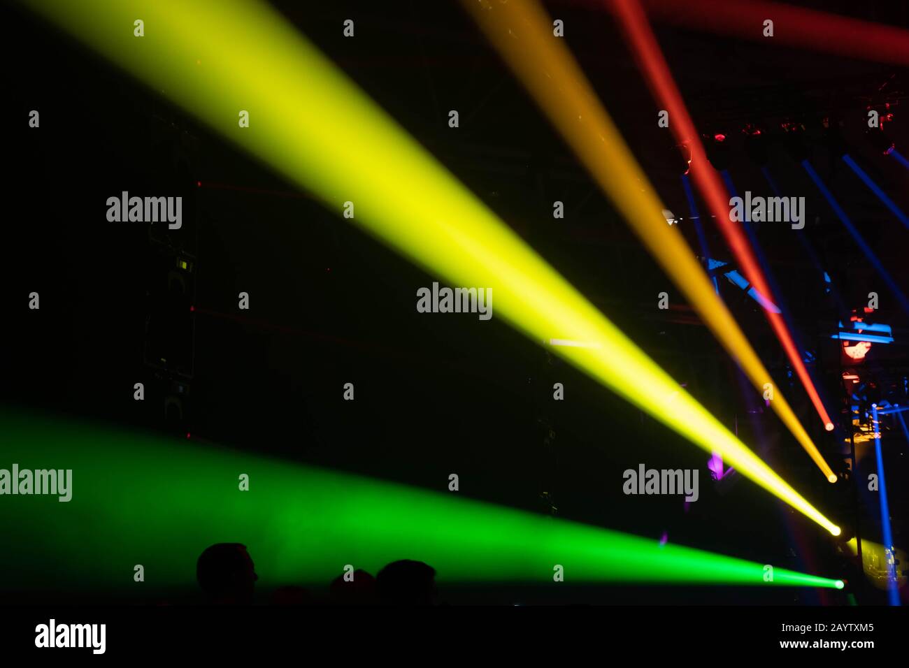 Scene, stage lights with colored spotlights and smoke, laser lights