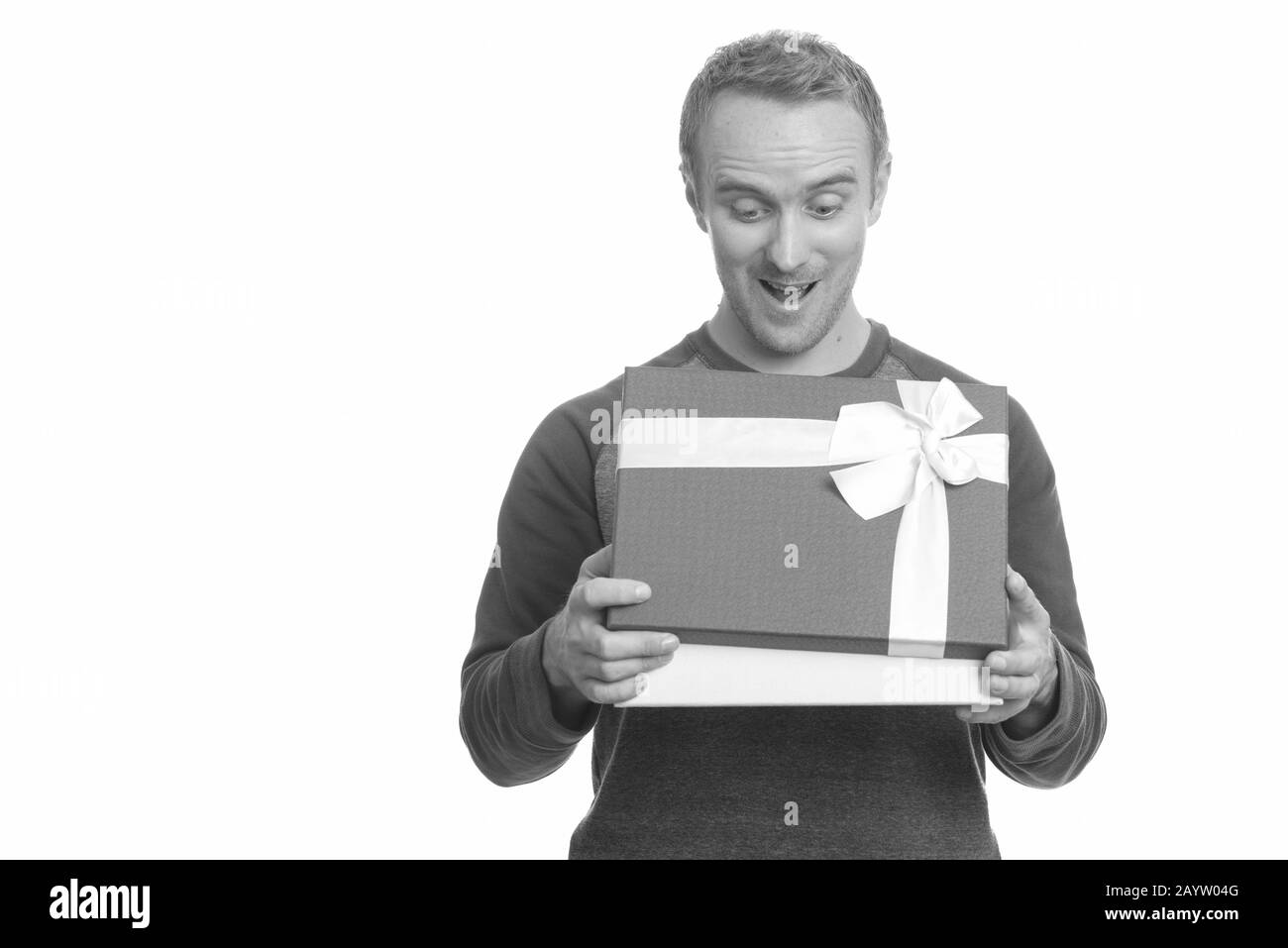 Portrait of handsome man with gift box Stock Photo