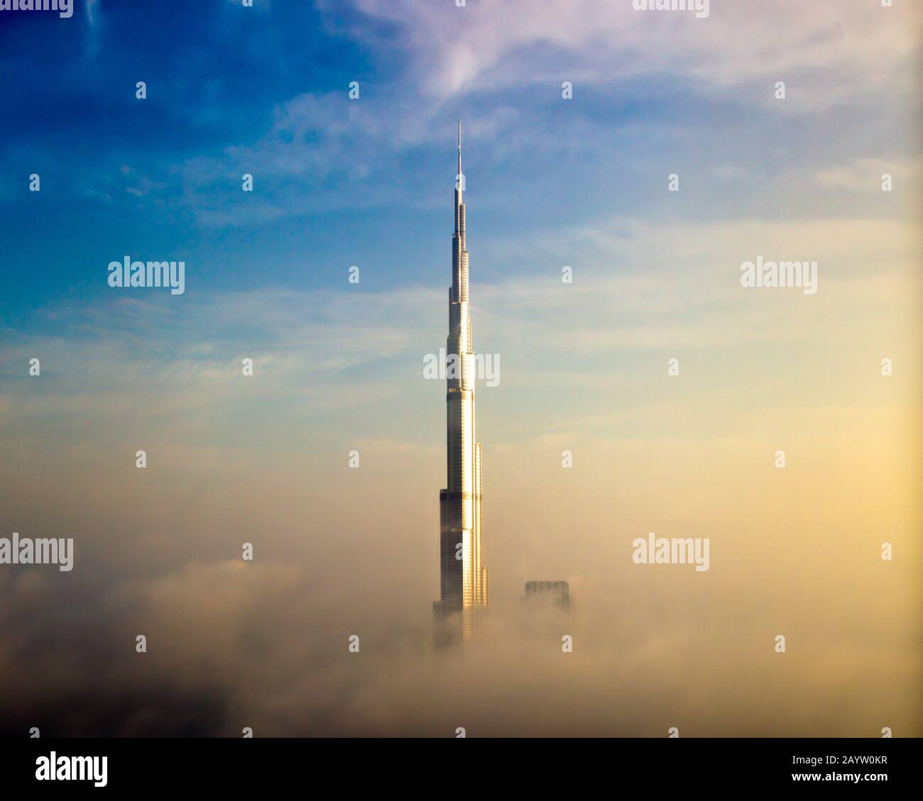 Burj khalifa in the clouds hi-res stock photography and Burj khalifa in the clouds hi-res stock photography and