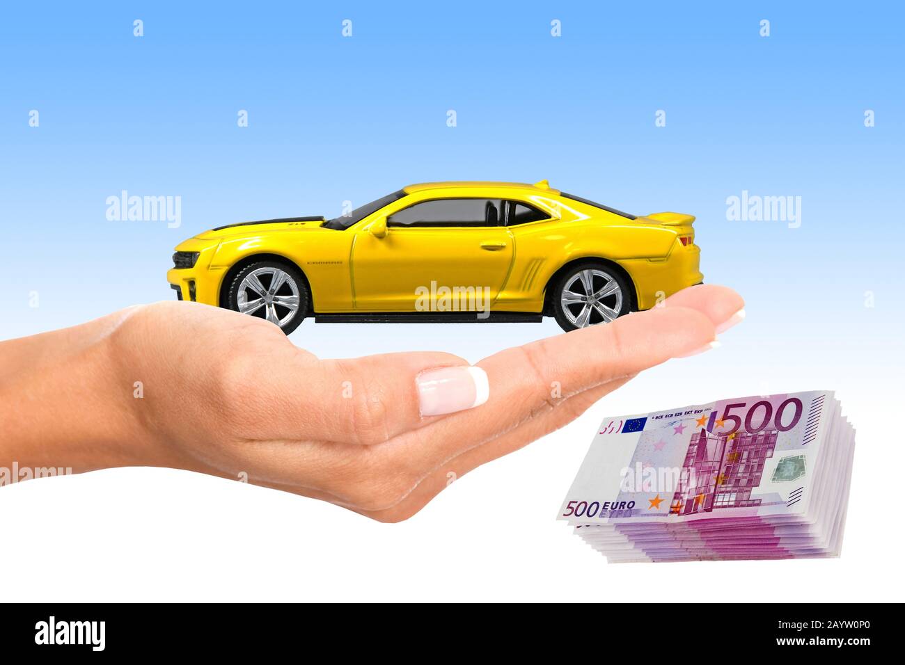 Chevrolet in a hand of a woman, 500 Euro bills in the background Stock Photo