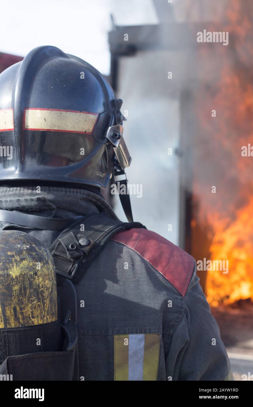 Firefighter putting out fire training station extinguisher backdraft ...