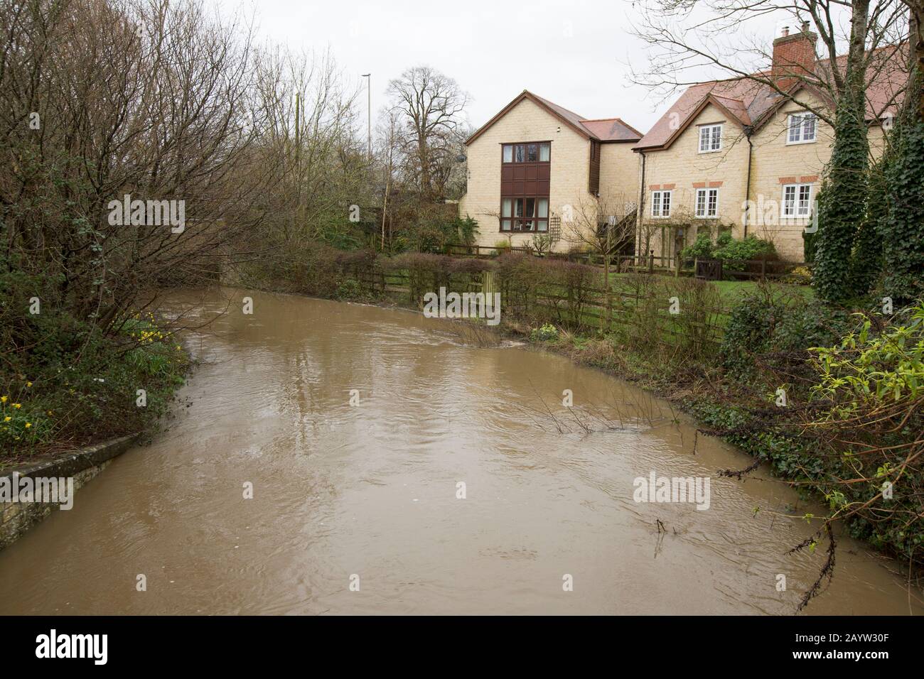The Dorset Stour River in Gillingham  flooding next to houses after heavy rainfall from Storm Dennis. The storm arrived on 15.02.2020 and caused wides Stock Photo