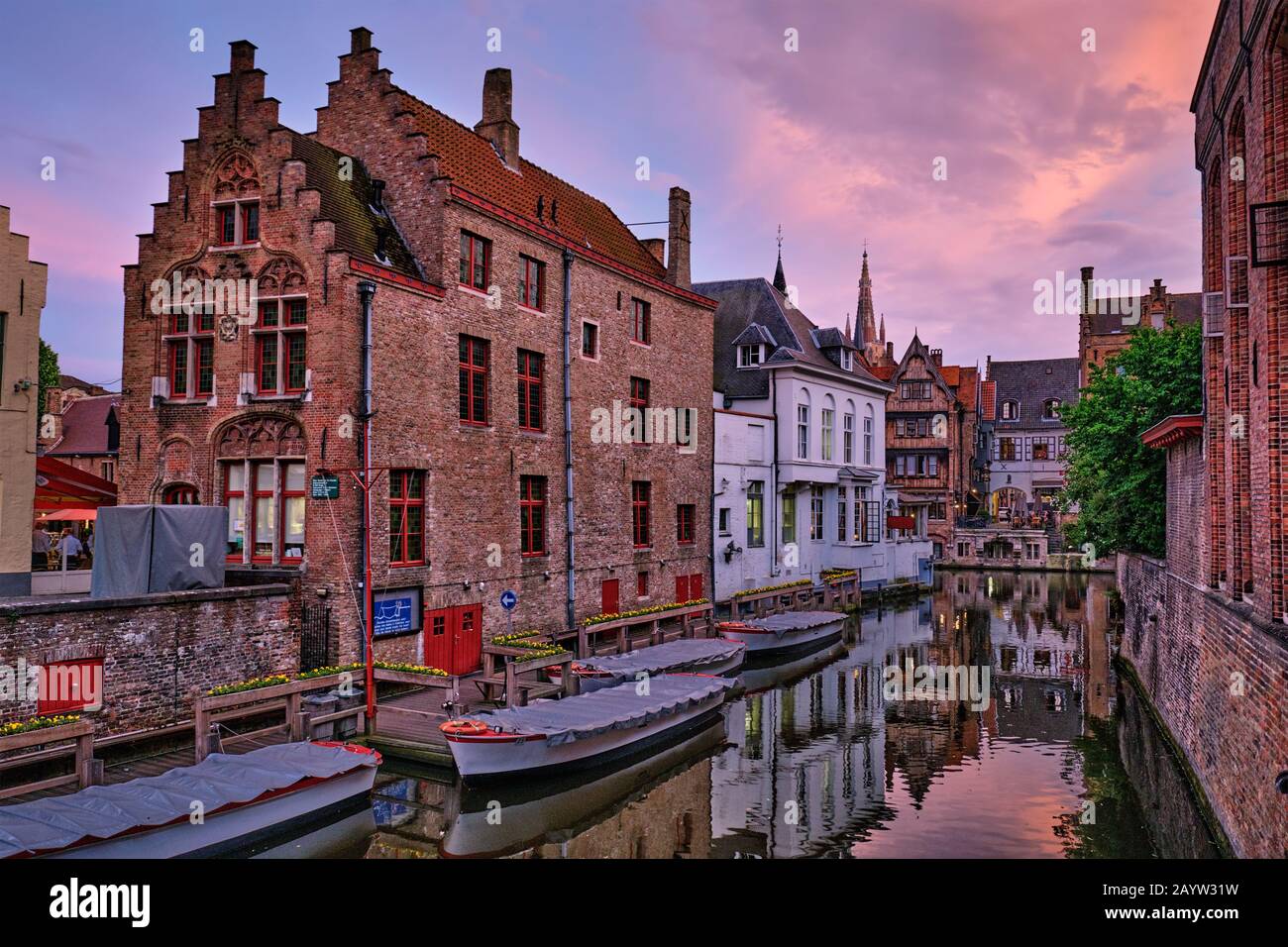 Bruges canal and houses at sunset. Brugge famous place, Belgium Stock