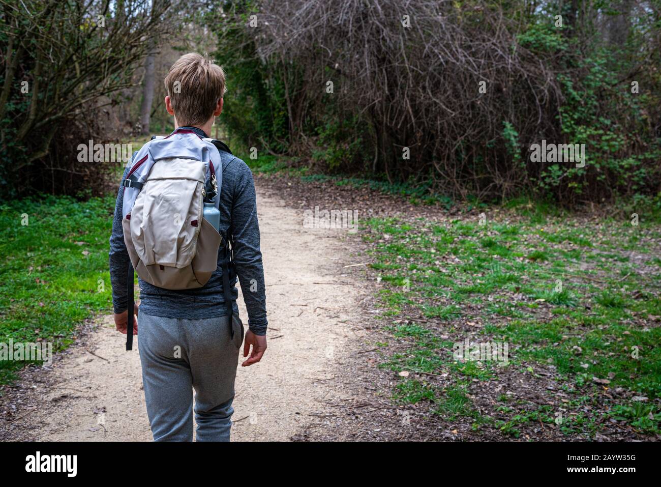 Teenage male back backpack hi-res stock photography and images - Alamy