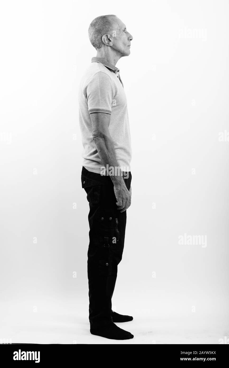 Man standing side view Black and White Stock Photos & Images - Alamy