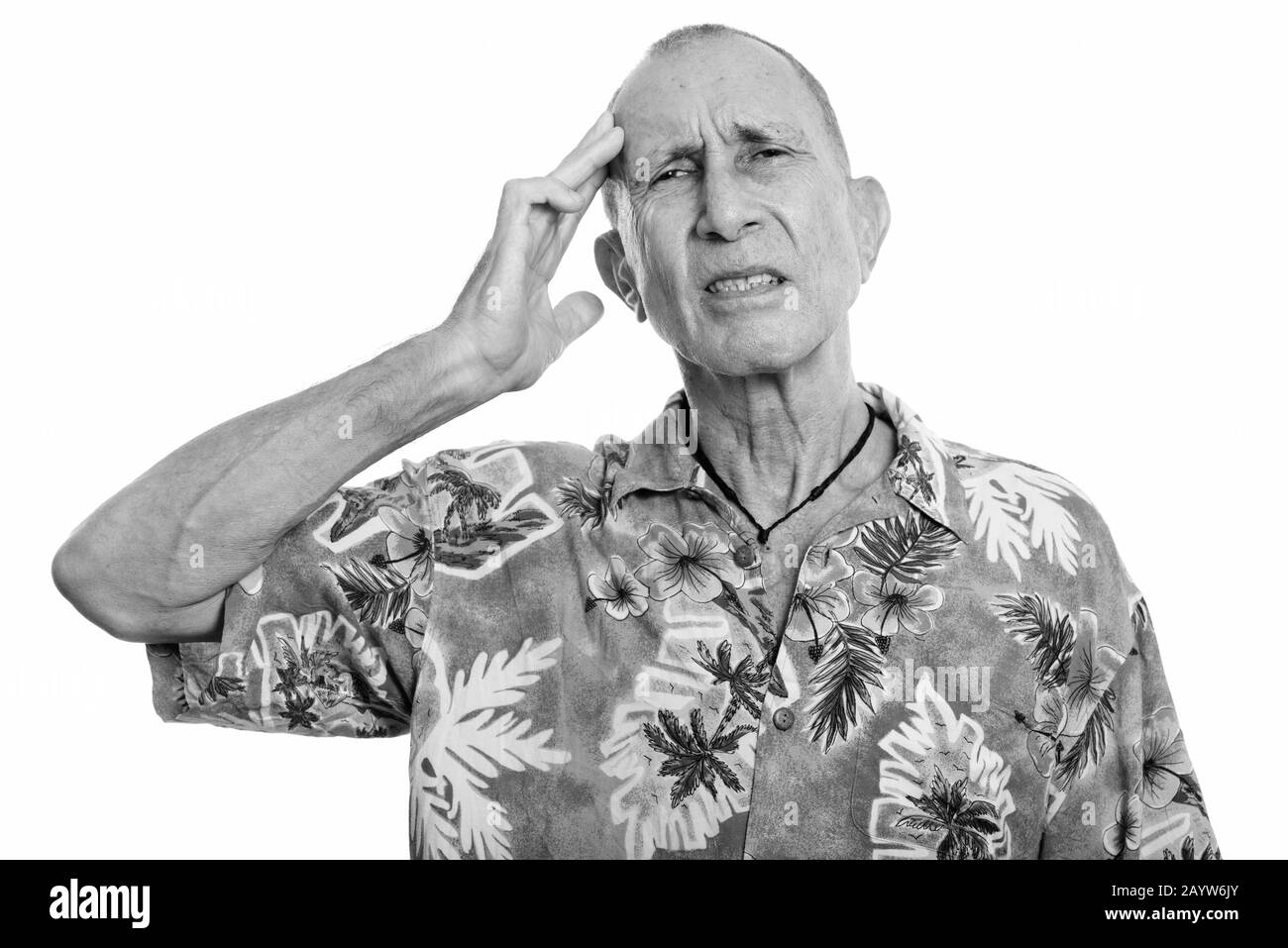 Portrait of stressed senior tourist man having headache Stock Photo