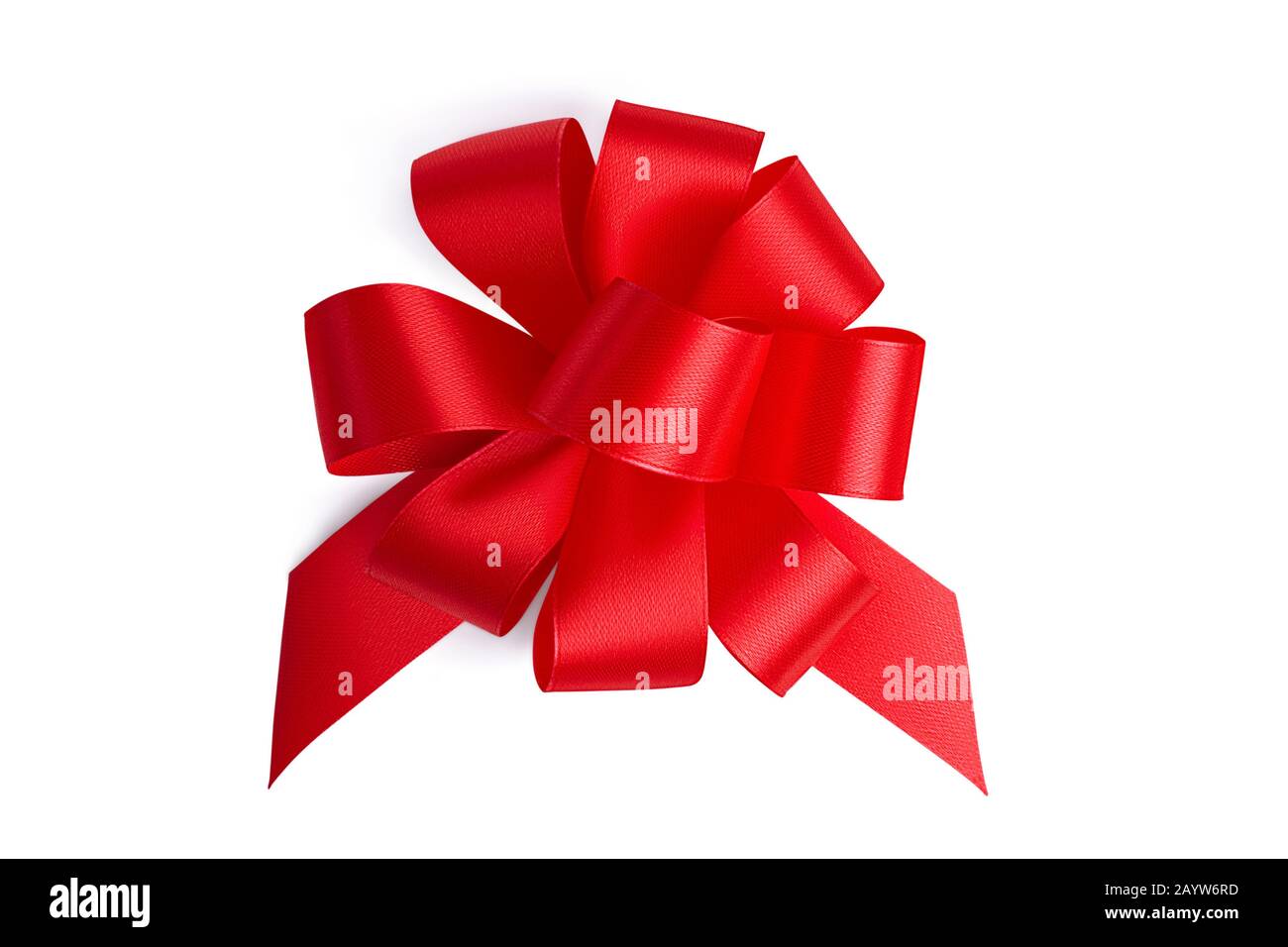 Flat lay big beautiful red ornate festive gift unusual bow with many