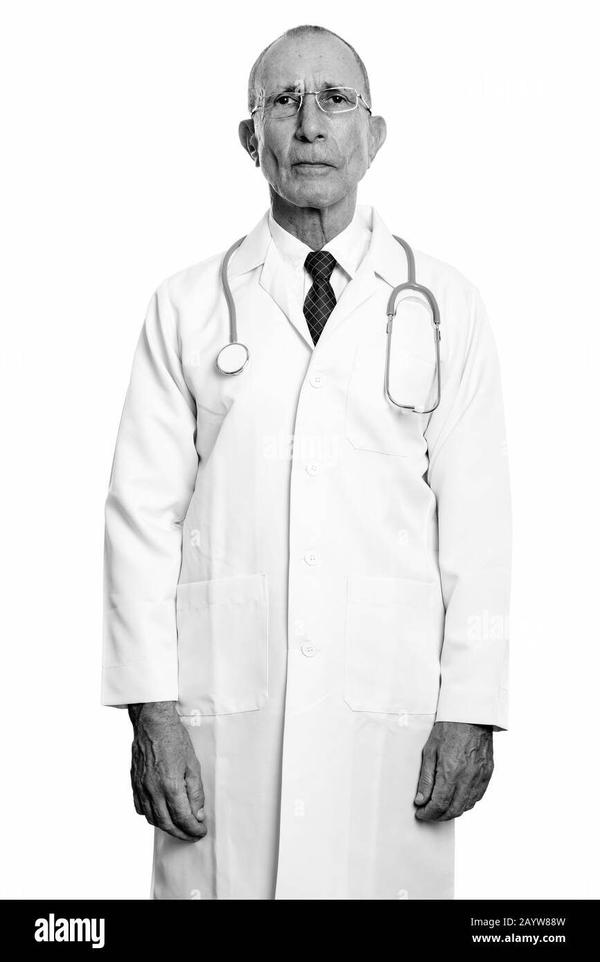 Doctor standing senior man hi-res stock photography and images - Alamy
