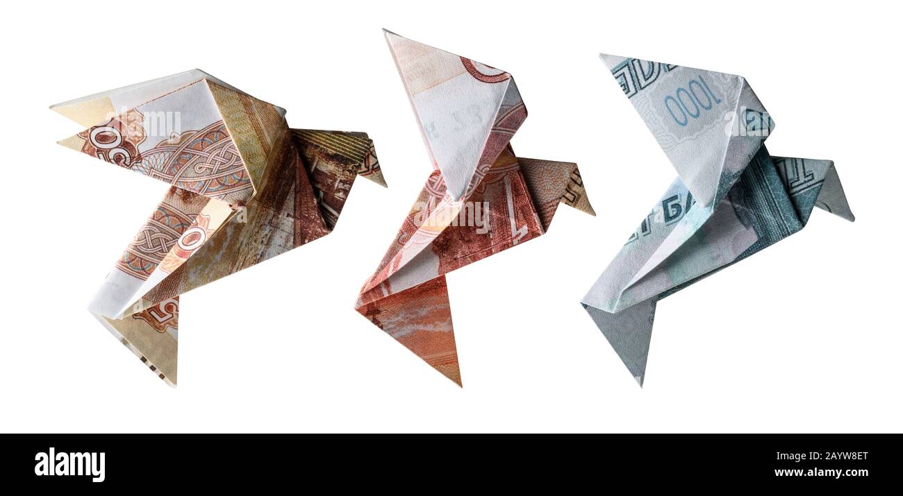 Russian rubles in the form of birds. Flying on a white background Stock Photo